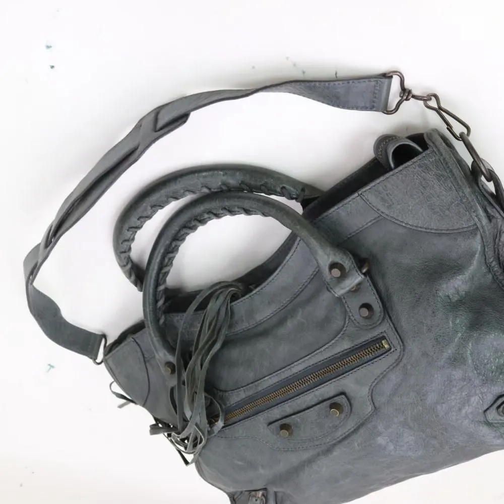 Balenciaga "City" style XL two-way satchel in pewter gray leather with gold hardware, fringe accents & a detachable shoulder strap